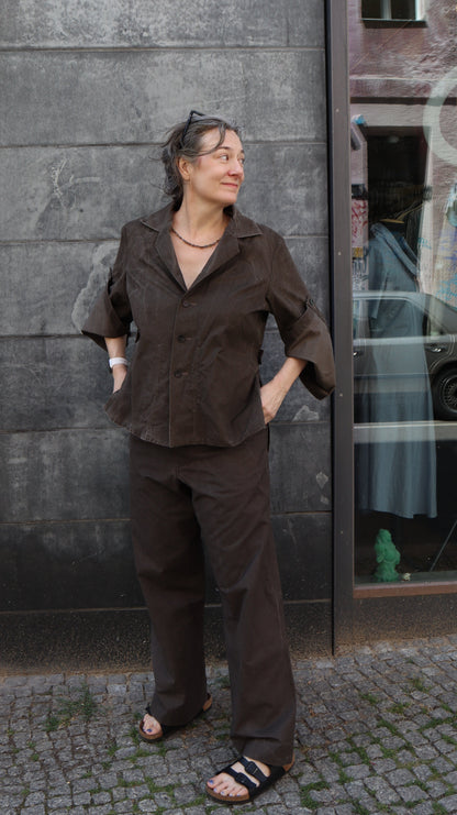 This jacket is the Obshort jacket. it has side slits and large internal pockets. it also features " lift-off" sleeves. Worn here with matching #stokxTaliHose